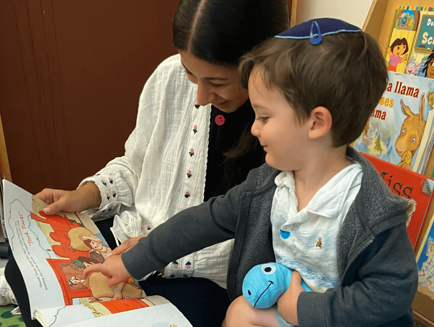 Teacher and student reading